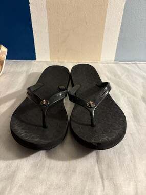 Coach Black Signature Turnlock Flip Flops